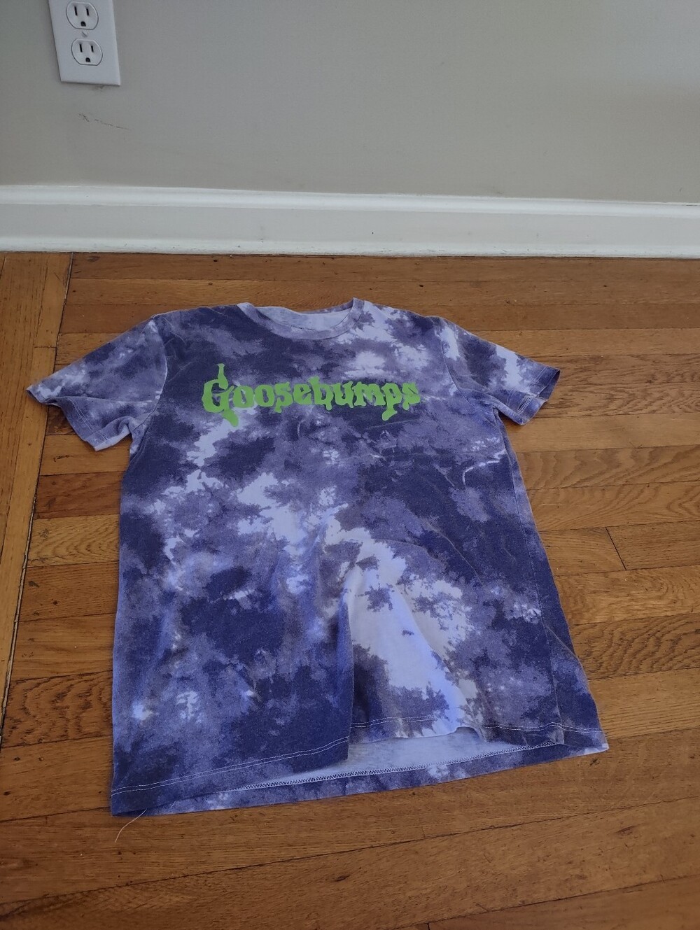 purple bleach tie dye goosebumps t shirt with green text fits like small